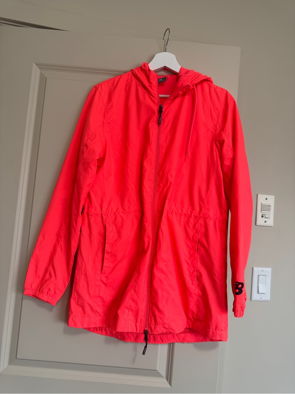 New Balance Neon Coral Hooded Rain Jacket
